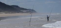 Sightseeing plane landing and beach fishing on Seventy-Five Mile Beach